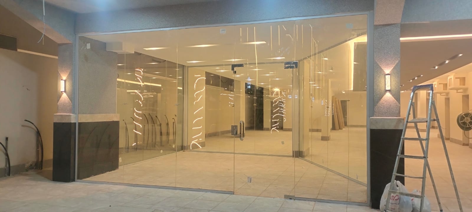 Capsule LED backlit mirror installation
